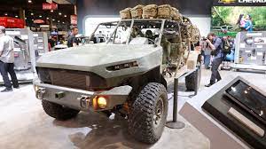 The Army’s Infantry Squad Vehicle seats 9 and can be dropped from a cargo plane